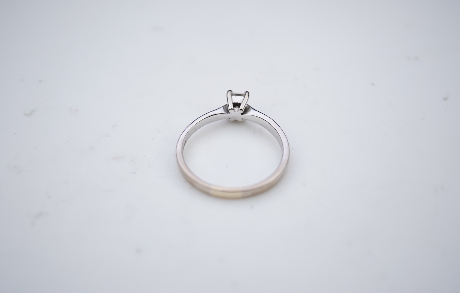 A diamond solitaire ring